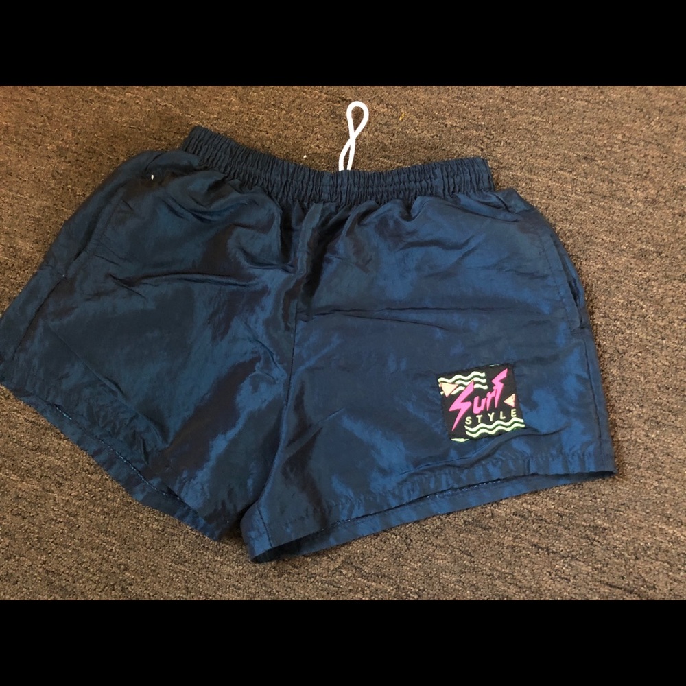 Surf style men’s medium short shorts. Really short